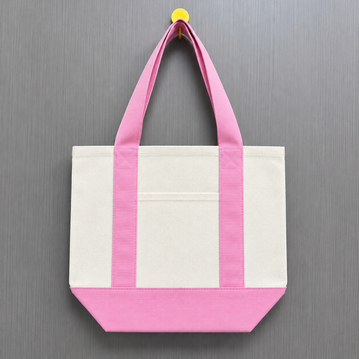 Pink color block mini canvas tote bag with natural canvas body, pastel pink handles and matching bottom panel, suitable for personalized patch decoration.